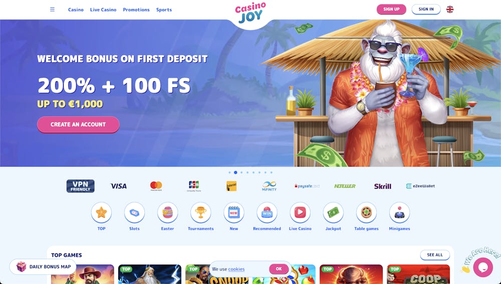 home page of Casino Joy, displaying a welcome bonus offer of 200% bonus + 100 free spins up to €1,000, with an image of a Yeti enjoying a drink at a tropical beach bar and a 
