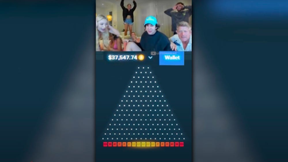 A family of content creators reacting to winning Plinko