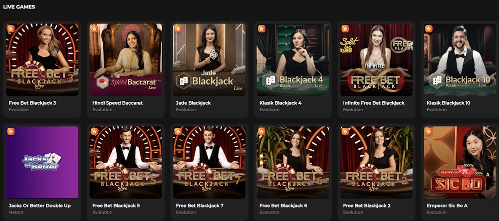 A selection of live casino games at Spades Queen, featuring a female dealer in Free Bet Blackjack, Hindi Speed Baccarat, Jade Blackjack, Klasik Blackjack, Infinite Free Bet Blackjack, and Emperor Sic Bo A.
